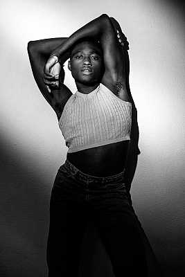 Young black dancer modeling in the studio.